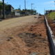 Moradores de mais uma rua de Mina Fluorita são beneficiados com pavimentação